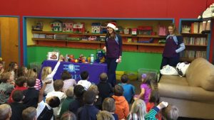 Talking about healthy snacks and how to brush teeth at Christ the King Elementary 