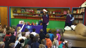 Talking about healthy snacks and how to brush teeth at Christ the King Elementary 