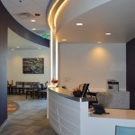 Receptionist desk from a right angle at {PRACTICE_NAME}